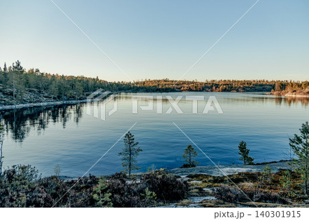 Landscape blue deep lake light sun, clouds sky mountains Ladoga skerries Karelia 140301915