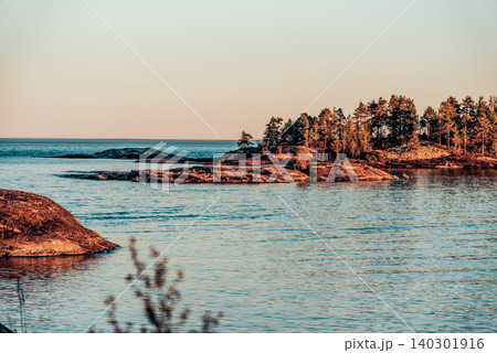 Landscape blue deep lake light sun, clouds sky mountains Ladoga skerries Karelia Landscape blue deep lake light sun, clouds sky mountains Ladoga skerries Karelia 140301916