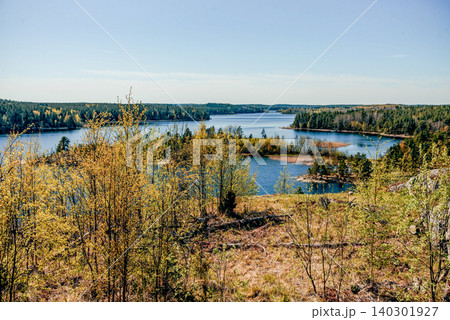 Landscape blue deep lake light sun, clouds sky mountains Ladoga skerries Karelia Landscape blue deep lake light sun, clouds sky mountains Ladoga skerries Karelia 140301927