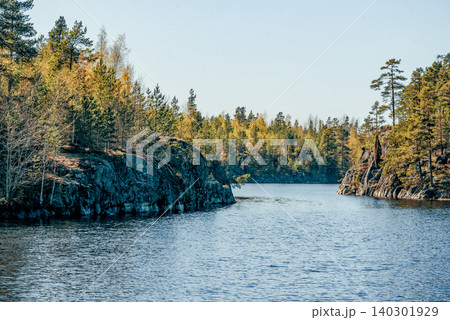 Landscape blue deep lake light sun, clouds sky mountains Ladoga skerries Karelia Landscape blue deep lake light sun, clouds sky mountains Ladoga skerries Karelia 140301929
