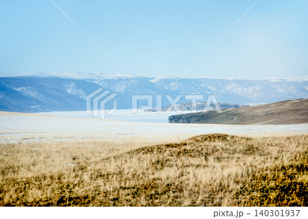 Winter landscape of icy frozen lake water Baikal in Siberia of Russia outdoor Winter landscape of icy frozen lake water Baikal in Siberia of Russia outdoor 140301937