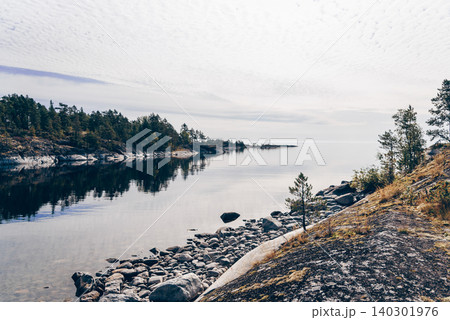 Landscape blue deep lake light sun, clouds sky mountains Ladoga skerries Karelia Landscape blue deep lake light sun, clouds sky mountains Ladoga skerries Karelia 140301976