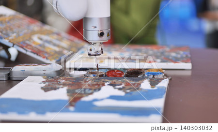 Robot artist painting a canvas during an AI technology exhibition event Robot artist painting a canvas during an AI technology exhibition event 140303032