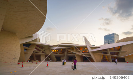 Doha, Qatar - Jan 06 2024, a panoramic view of National Museum of Qatar courtyard, patio, with some people in it, in shape of desert rose, at evening, Doha, Qatar Doha, Qatar - Jan 06 2024, a panoramic view of National Museum of Qatar courtyard, patio, with some people in it, in shape of desert rose, at evening, Doha, Qatar 140306402