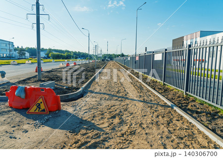 Urban sidewalk construction site with metal fence and road signs Urban sidewalk construction site with metal fence and road signs 140306700