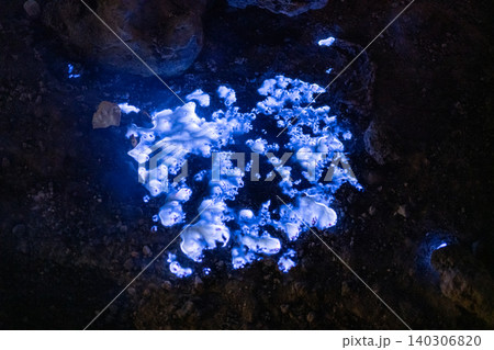 Blue flames caused by the burning of sulfur in the Ijen caldera, East Java of Indonesia. This electric-blue flame results from sulfuric gases creating a mesmerizing display visible only at night. 140306820