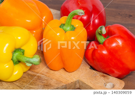 Close-up of a sweet pepper on a wooden background. 140309059