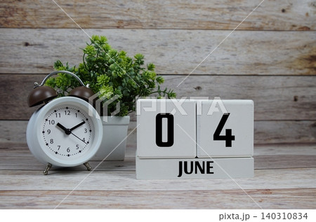 Wooden Calendar Showing the Date of June 4th. Day 4 of June Month Wooden Calendar Showing the Date of June 4th. Day 4 of June Month 140310834