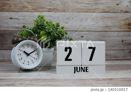 Wooden Calendar Showing the Date of June 27th. Day 27 of June Month Wooden Calendar Showing the Date of June 27th. Day 27 of June Month 140310857