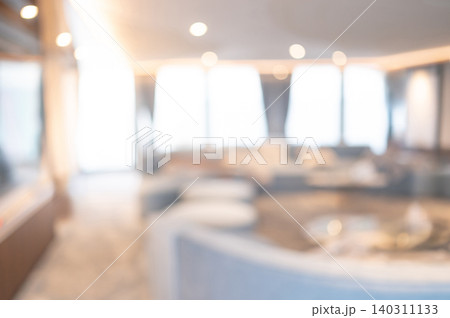 Abstract blurred living room with soft couch and wide window Abstract blurred living room with soft couch and wide window 140311133