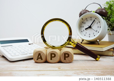 APP Automated Payment Plan alphabet letters with magnifying glass, calculator and alarm clock APP Automated Payment Plan alphabet letters with magnifying glass, calculator and alarm clock 140311388
