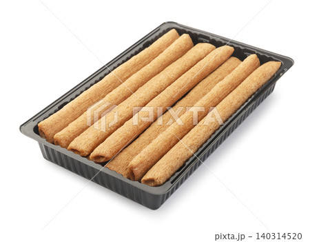 Wafer rolls in a tray on a white background. Isolated Wafer rolls in a tray on a white background. Isolated 140314520