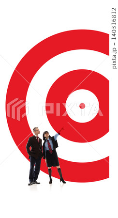 Business team looking toward giant target in goal setting metaphor. Business team looking toward giant target in goal setting metaphor. 140316812