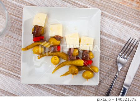 Four gildas, Spanish snack, served on plate 140321378