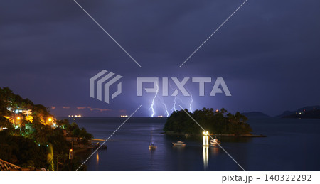 Thunderstorm, sea and land with bad weather, nature and raining with storm and New York city. Clouds, climate change or ocean with lightning or night with warning or island with winter, dark or water Thunderstorm, sea and land with bad weather, nature and raining with storm and New York city. Clouds, climate change or ocean with lightning or night with warning or island with winter, dark or water 140322292