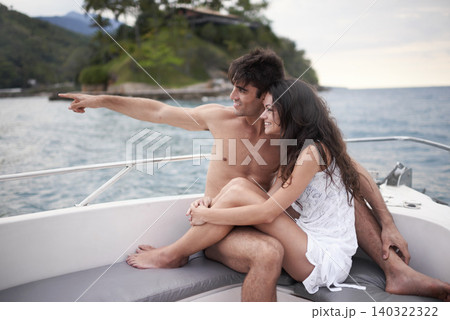 Couple, boat and travel on ocean on vacation, love and relax by water on summer holiday. People, cruise and bonding for relationship in outdoors, support and care on weekend trip to sea on yacht Couple, boat and travel on ocean on vacation, love and relax by water on summer holiday. People, cruise and bonding for relationship in outdoors, support and care on weekend trip to sea on yacht 140322322