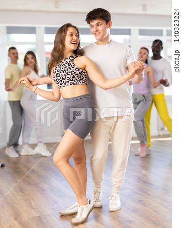 young woman and man dancing waltz young woman and man dancing waltz 140323224