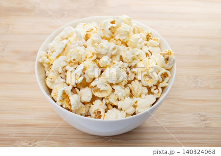 Popcorn bowl on wooden tray for Festa Junina celebration 140324068