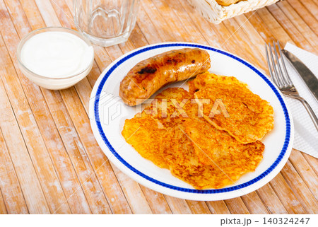 Potato pancakes with sausage and sour cream Potato pancakes with sausage and sour cream 140324247