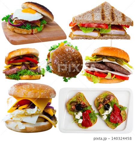 Hamburgers, sandwiches and other fastfood dishes isolated on white background 140324458