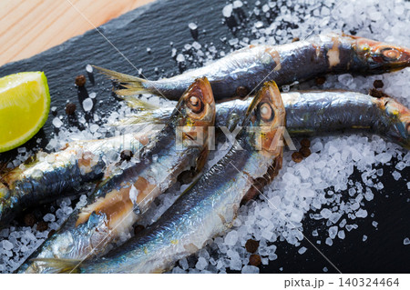 Baked sardines on sea salt Baked sardines on sea salt 140324464