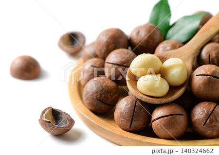 Macadamia Nuts and Kernels on Wooden Spoon with Copy Space Macadamia Nuts and Kernels on Wooden Spoon with Copy Space 140324662