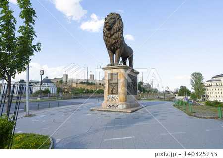 the lion statue at the entrance to the Gotse Delchev Bridge in Skopje, North Macedonia the lion statue at the entrance to the Gotse Delchev Bridge in Skopje, North Macedonia 140325255
