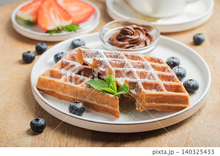 Belgium waffles Homemade waffles with strawberries Belgium waffles Homemade waffles with strawberries 140325433