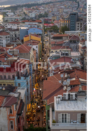 Istanbul, Turkiye - Bustling Street Scene at Dusk with Crowds and Outdoor Dining Istanbul, Turkiye - Bustling Street Scene at Dusk with Crowds and Outdoor Dining 140326984