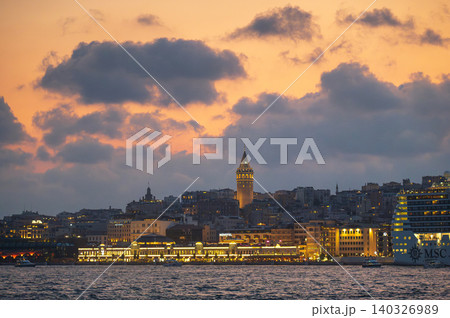 Istanbul at Dusk: Galata Tower Illuminated by Sunset Glow Istanbul at Dusk: Galata Tower Illuminated by Sunset Glow 140326989