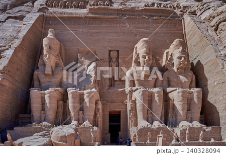 Abu Simbel, Aswan, Egypt- February 10 2025: Abu Simbel Temples in Abu Simbel Aswan, Egypt exterior daylight shot showing The Great Temple of Ramesses II with tourist at the main entrance Abu Simbel, Aswan, Egypt- February 10 2025: Abu Simbel Temples in Abu Simbel Aswan, Egypt exterior daylight shot showing The Great Temple of Ramesses II with tourist at the main entrance 140328094