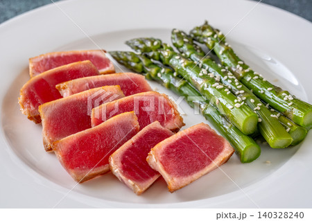 Perfectly Seared Yellowfin Tuna Steak With Asparagus And Sesame Seeds Perfectly Seared Yellowfin Tuna Steak With Asparagus And Sesame Seeds 140328240
