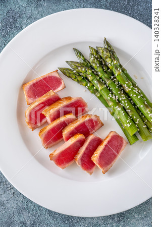Perfectly Seared Yellowfin Tuna Steak With Asparagus And Sesame Seeds Perfectly Seared Yellowfin Tuna Steak With Asparagus And Sesame Seeds 140328241