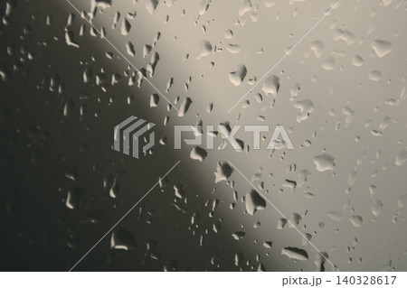 Wet window full of water drops Wet window full of water drops 140328617