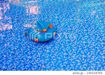 Robotic vacuum float activity in clear water of swimming pool surrounded by tiles, enjoying sunny summer Robotic vacuum float activity in clear water of swimming pool surrounded by tiles, enjoying sunny summer 140328769