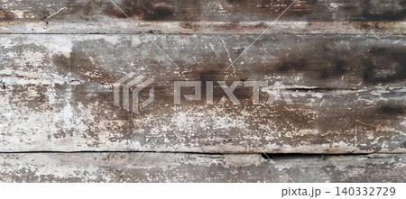 Weathered wood plank texture with a rustic vintage touch. Weathered wood plank texture with a rustic vintage touch. 140332729