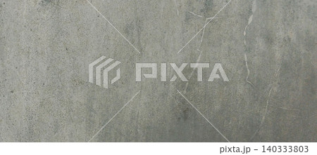 Grey concrete wall texture with subtle natural patterns. 140333803