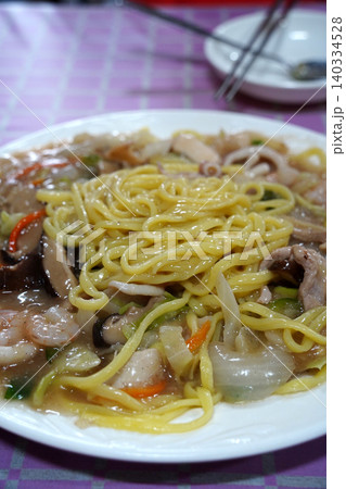 Korean unique stir fried noodles with thick savory sauce and shrimps Korean unique stir fried noodles with thick savory sauce and shrimps 140334528