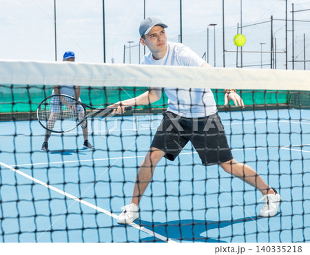 Sportsman ready to hit volley. Sportsman ready to hit volley. 140335218