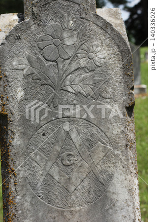 Historic Headstone With Flower and Mason Symbol in Rural East TX Cemetery Historic Headstone With Flower and Mason Symbol in Rural East TX Cemetery 140336026