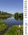 Fisherman catches the fish in the River 140338056