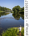 Fisherman catches the fish in the River 140338057