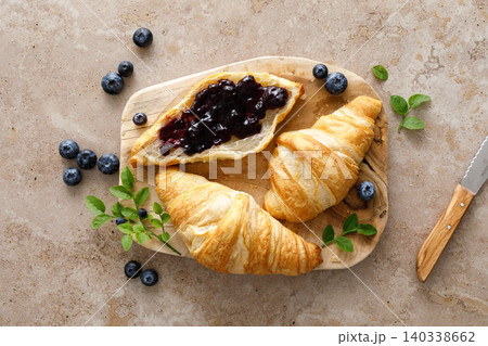 Croissant with blueberries for breakfast 140338662