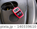 Red OBD2 code reader diagnostic scanner tool 140339610