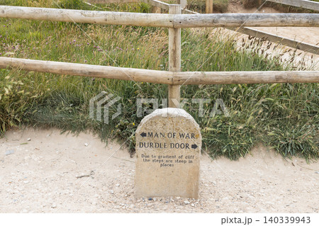 Stone signpost for Man O'War Beach and Durdle Door in Dorset Stone signpost for Man O'War Beach and Durdle Door in Dorset 140339943