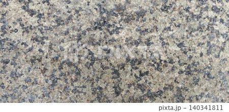 Natural granite texture with mineral patterns and polished surfaces. 140341811