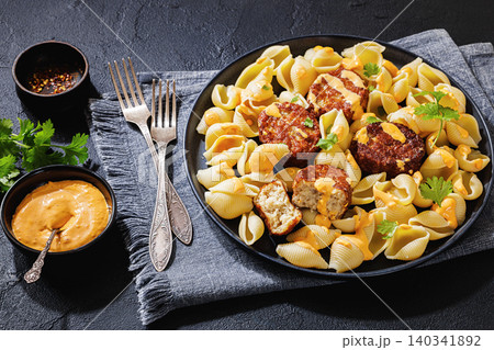 Shell Pasta And Meat Patties on a Plate 140341892