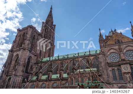 South side of Strasbourg Cathedral under blue sky South side of Strasbourg Cathedral under blue sky 140343267