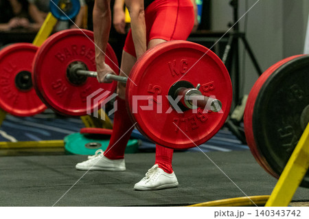 Powerlifter athlete perform deadlift 140343742