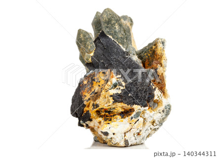 Macro mineral stone Quartz Hedenbergite Prase on ilvite on a white background Macro mineral stone Quartz Hedenbergite Prase on ilvite on a white background 140344311